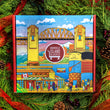 Load image into Gallery viewer,  High Quality mailer box with a beautifully illustrated scene of Granville Island, Giants Mural, Burrard Bridge, and Vancouver skyline on the gift box in a circle of Christmas decor.